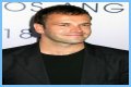 Jonny Lee Miller flashes ink for Ellen charity